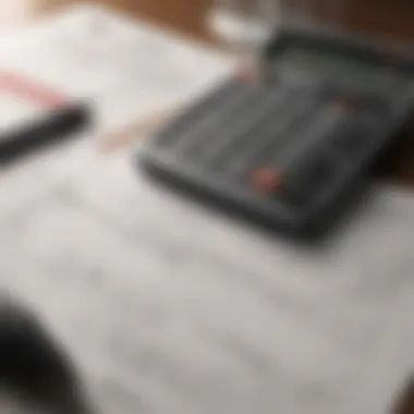 A close-up of a calculator and mortgage documents on a desk